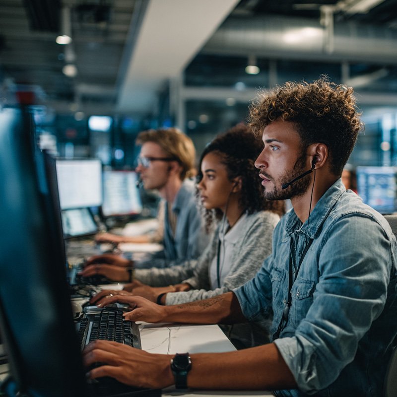 IT team collaborating to deploy cloud and DevOps solutions with Red Hat tools